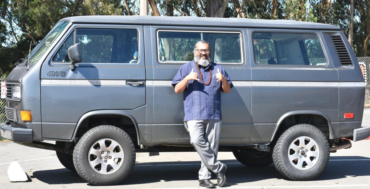 Juan-Antonio Santisteban standing outside of his stylish van, insistently named “Frosty” by previous owner