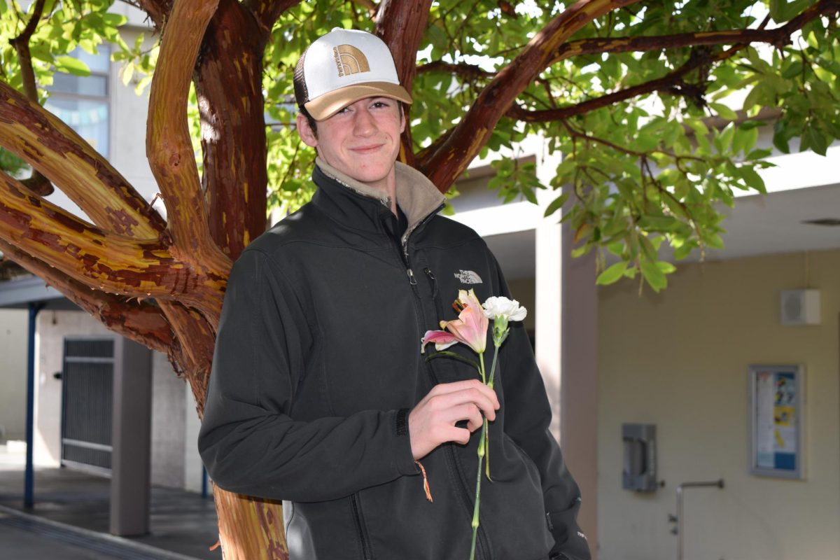 O’Brien posing with flowers.