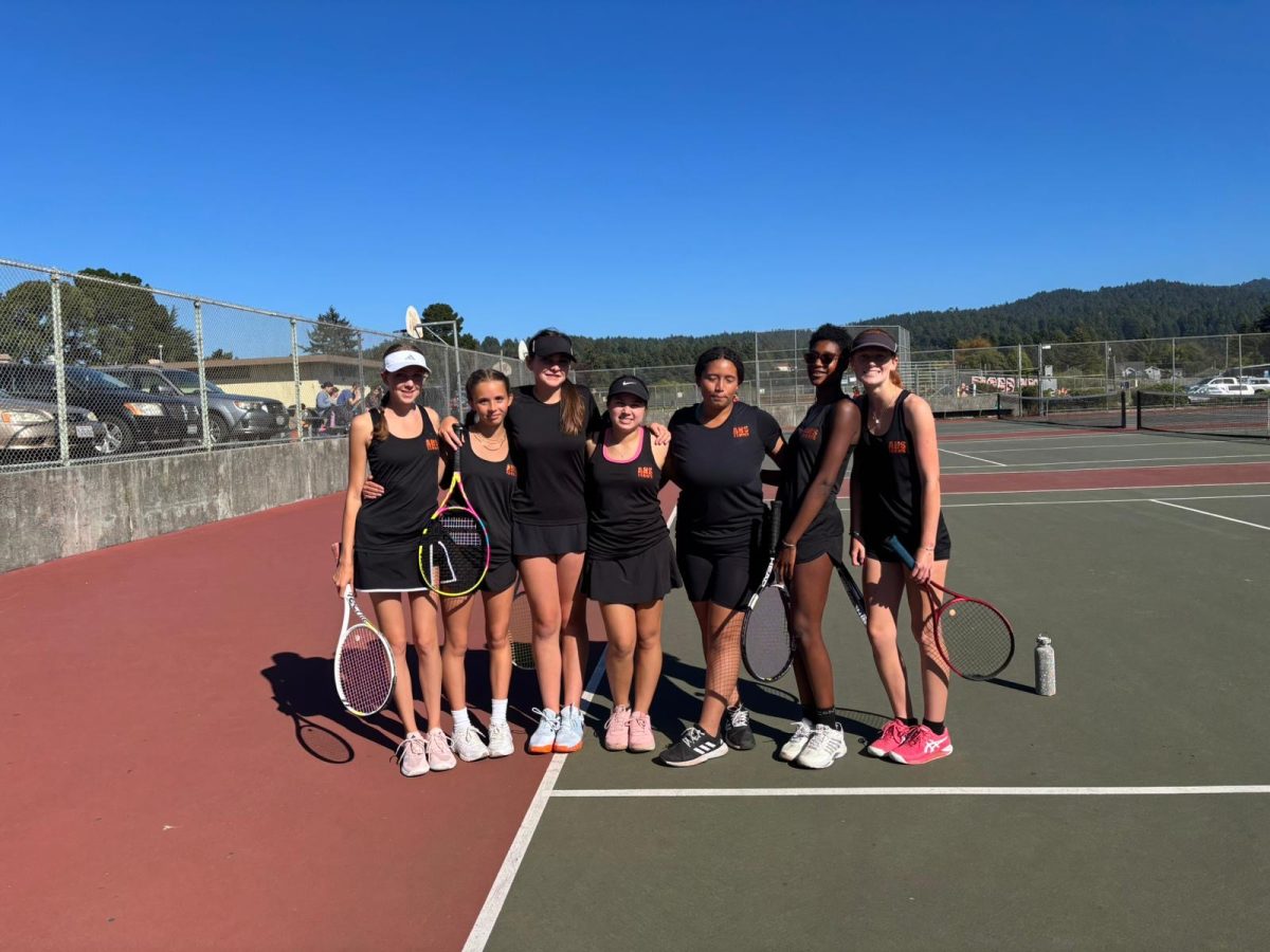 Some of the tennis players posing before a match.