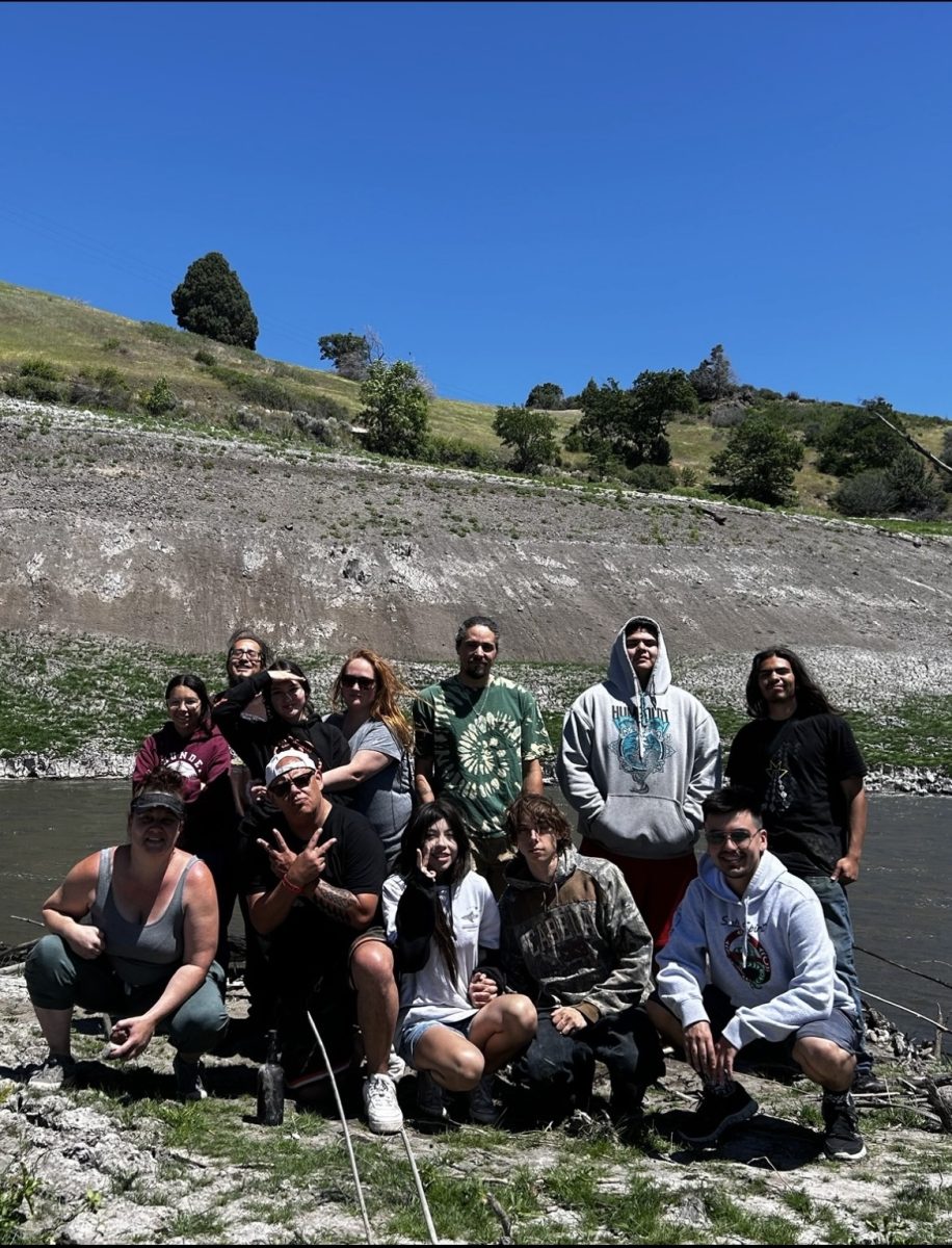 Arcata High Native American club and local community members posed on the banks of the Klamath River. 