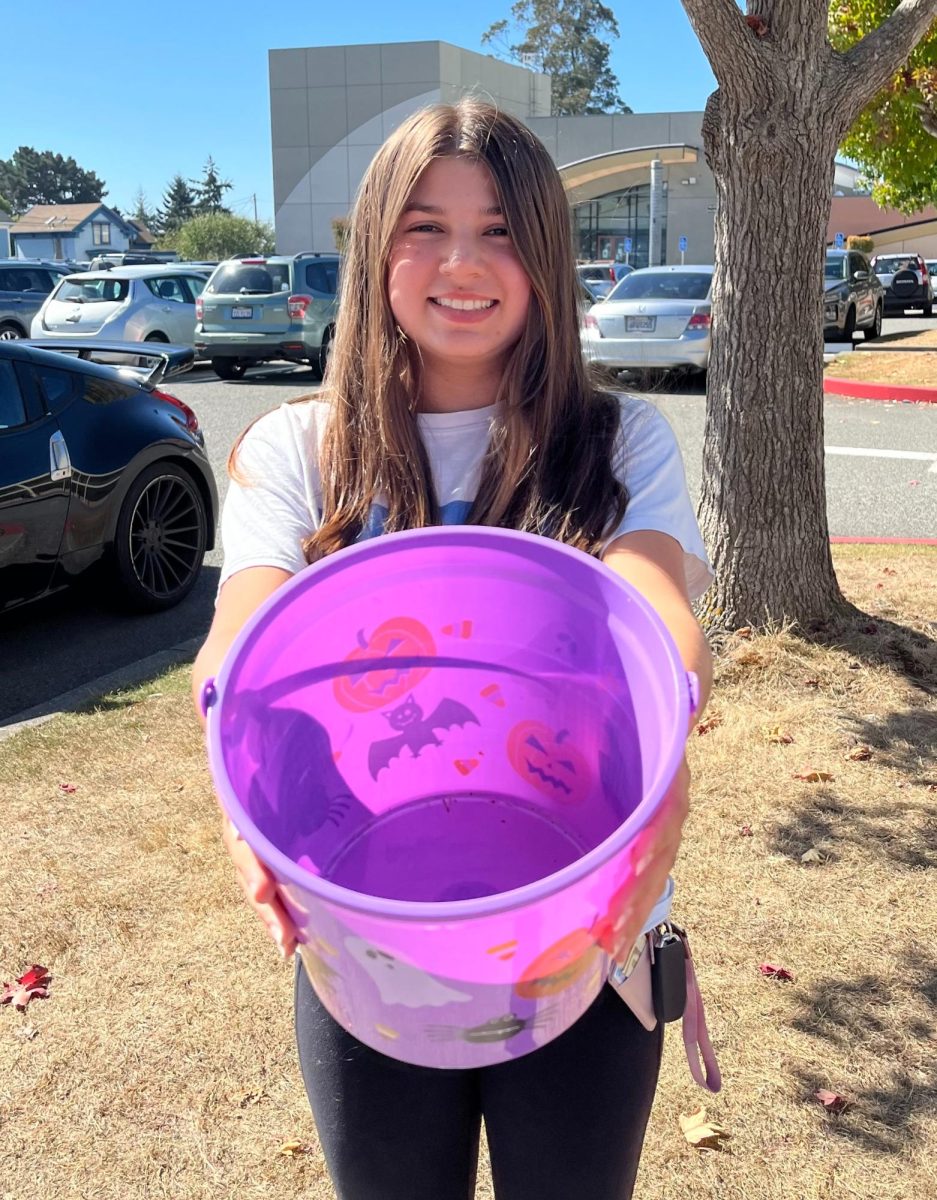 Jenna Renteria poses with her Halloween basket