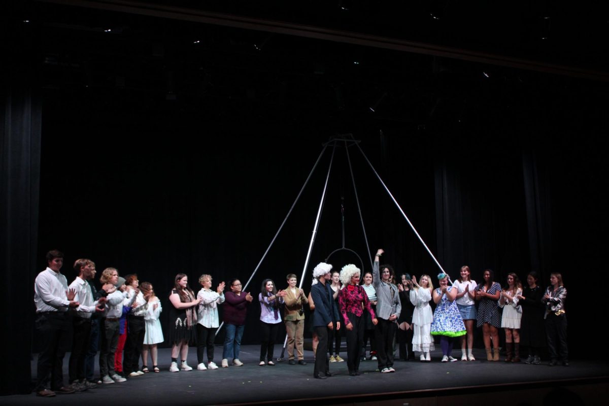 Performers bowing to the audience after their show.