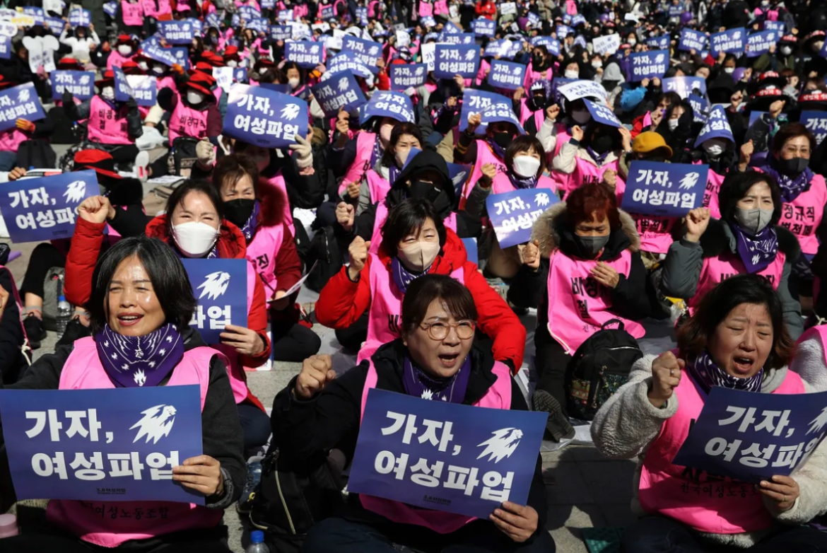 Women attending an International Women's Day rally in Seoul.