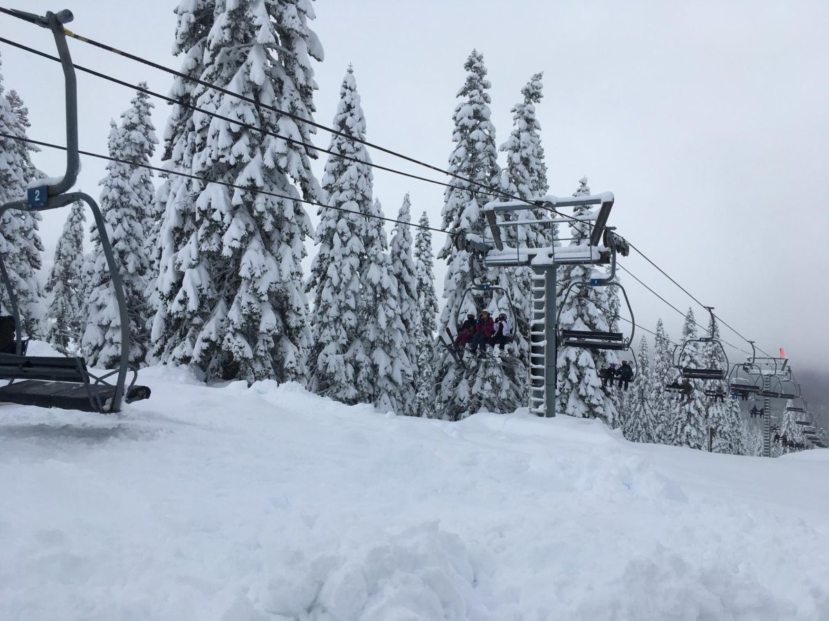 Snowboarders catch an edge