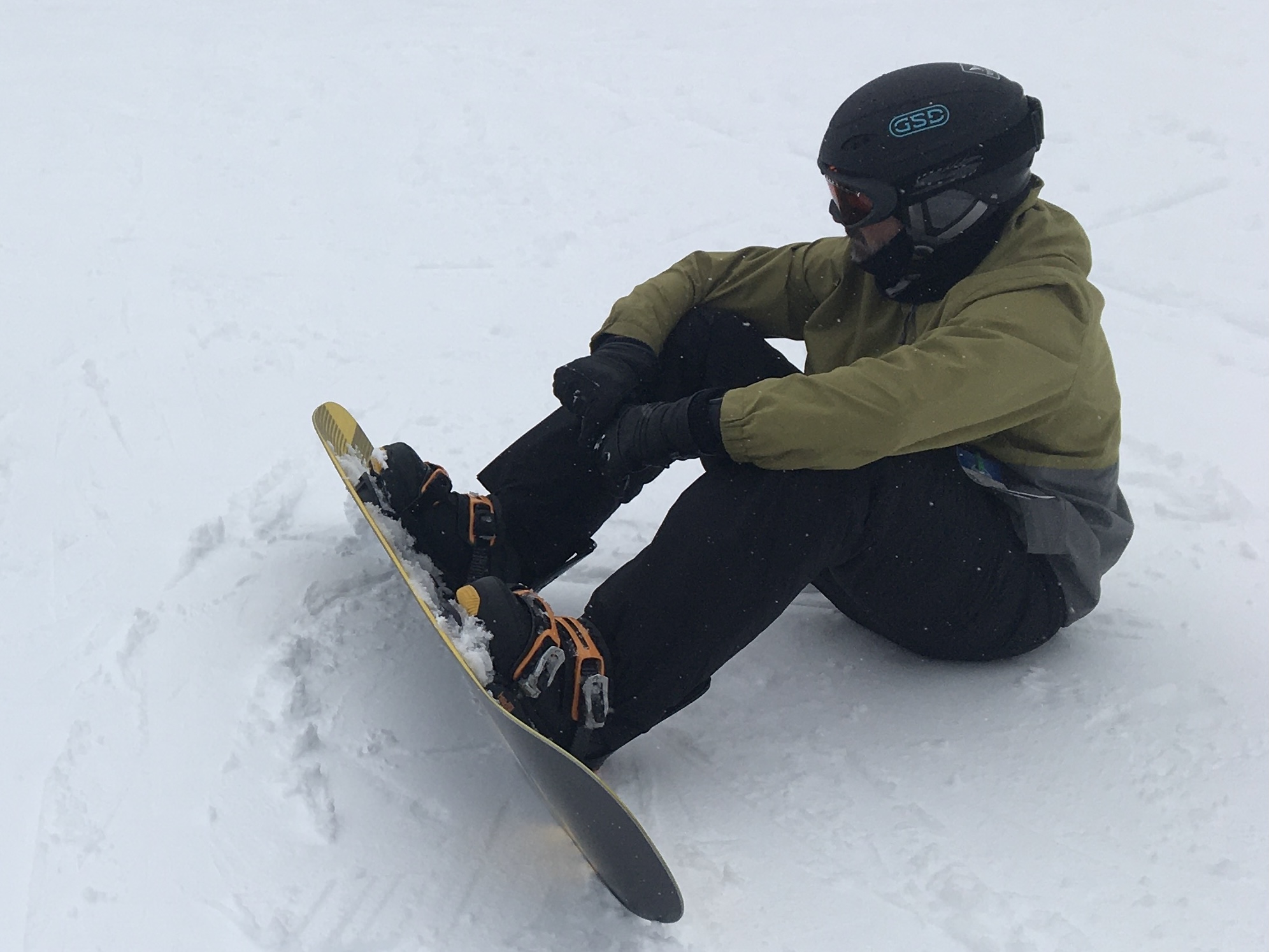 Snowboarders catch an edge