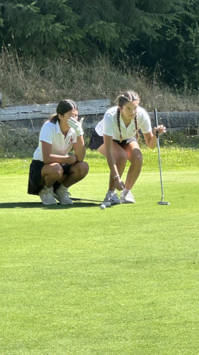 Lucia and Toni on the golf field.