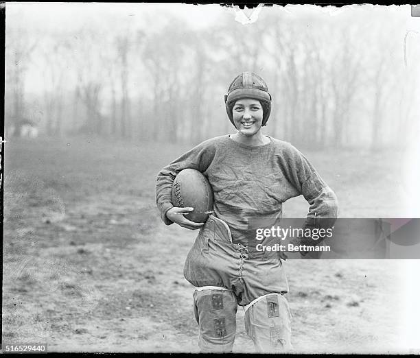 (Original Caption) Called the Feminine Red Grange. The girls of the women's football them at Upsola College, East Orange, N.J. have tackled football with the same enthusiasm that they formerly tackled dancing and other sports and they now rub their noses in the mud as frequently as they formerly rubbed them in the powder puff. Photo shows Capt. Gladys Scherer, who is known as the Red Grange of woman football.