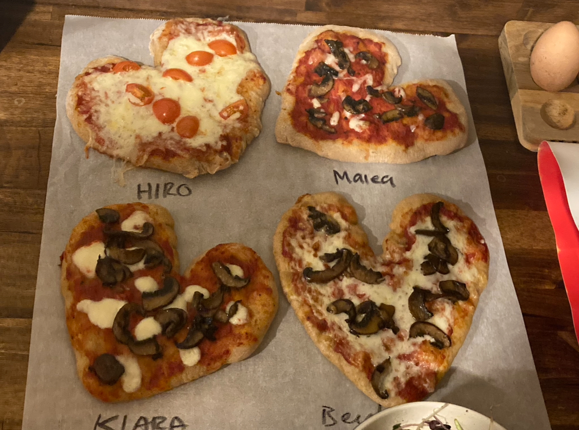 Heart-shaped pizzas for a Galentine's Day party