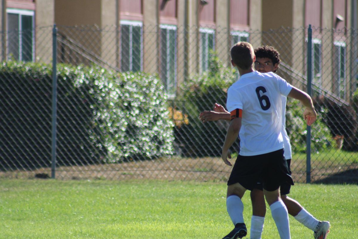 Jonah Morgan and Victor Vega celebrating 