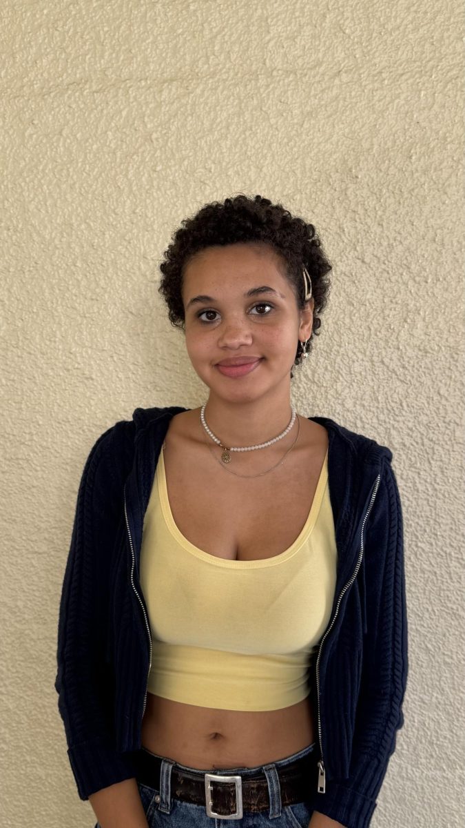 Omari Ferguson Johnson posing for her photo, she'll be Raven from, Teen Titans Go!