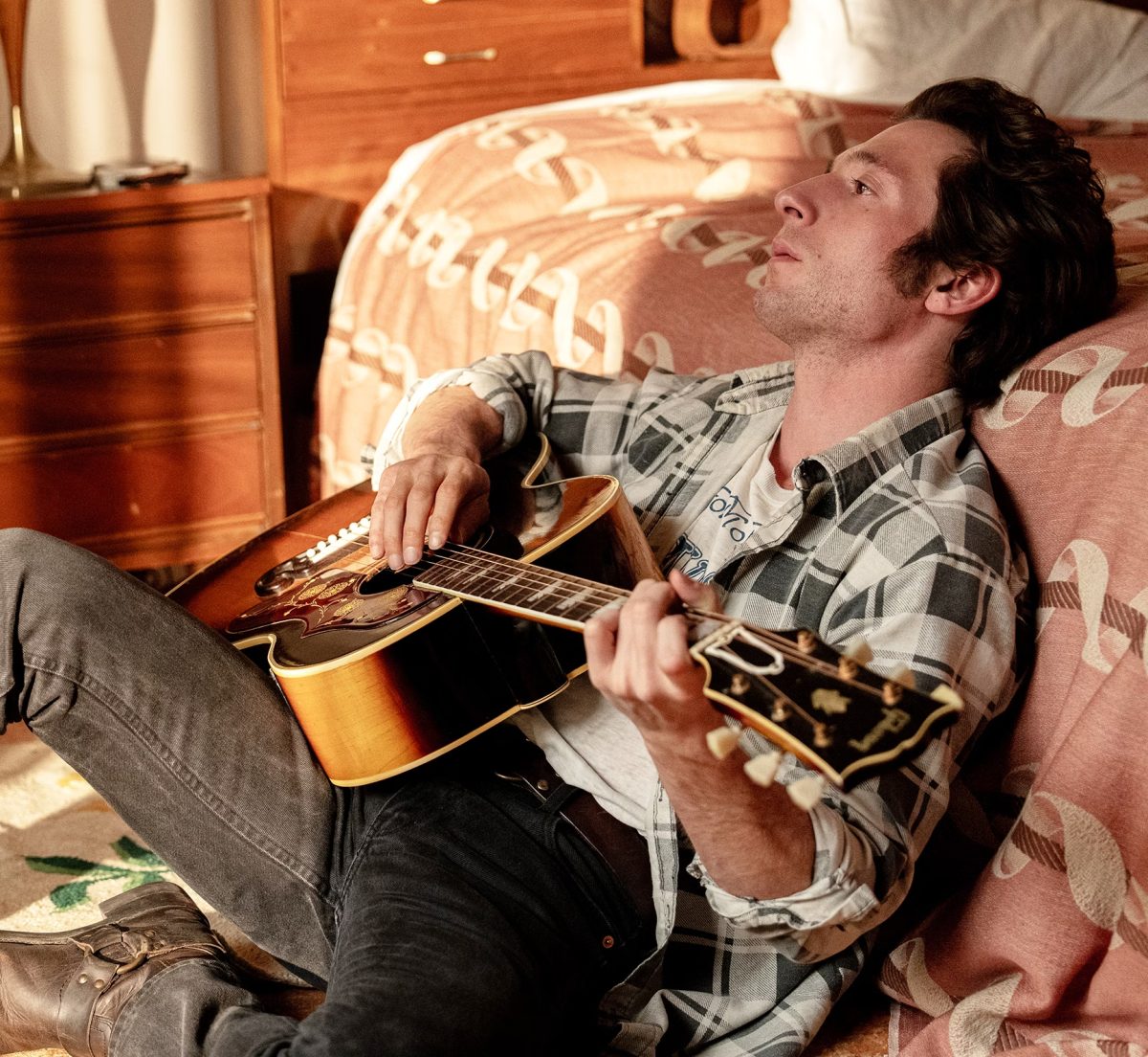 Jeremy Allan White as Bruce Springsteen.