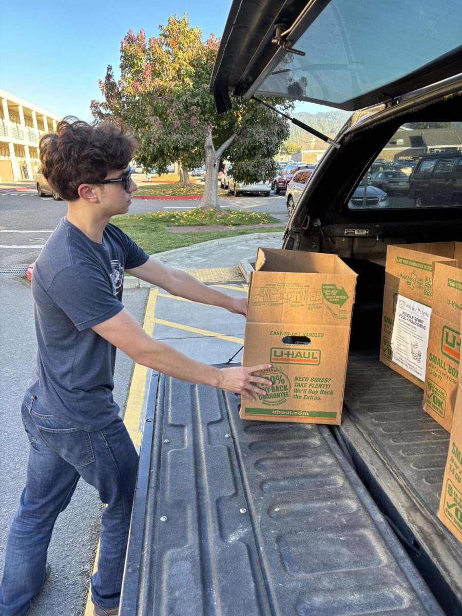 Aaron Sanford helping out with the food drive. 