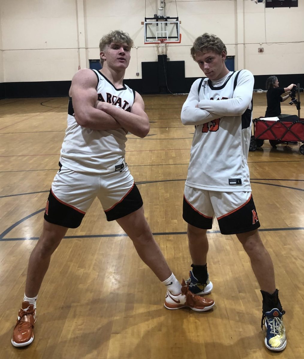 seniors, Luke Lemke and Jonah Morgan  waiting for there turn to get there picture day during picture day.