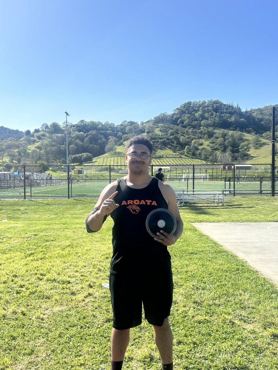 Collenberg posing after his school record throw