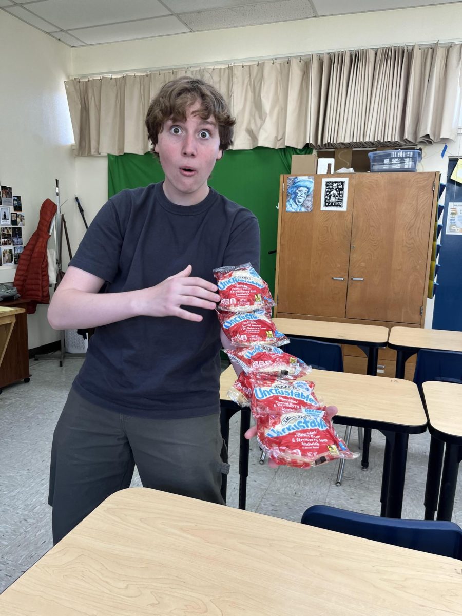 Wyatt O-Conner spreading fat Uncrustables.